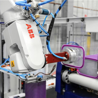 ABB IRB 1200 Brazo robótico industrial con agarre CNGBS como equipo de manipulación de materiales CNC