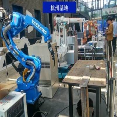 Plataforma que apila el robot 6 AXIS Motoman GP50 con el manipulante robótico del brazo