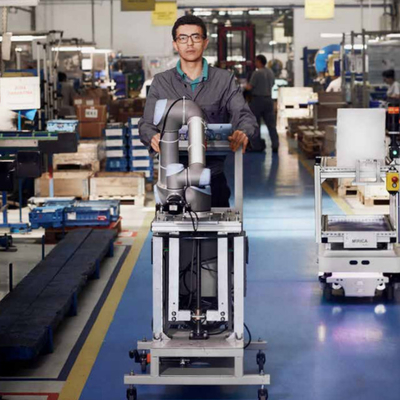 Brazo robótico industrial de Ur3 Cobot con el sistema visual de Cognex del agarrador RG6